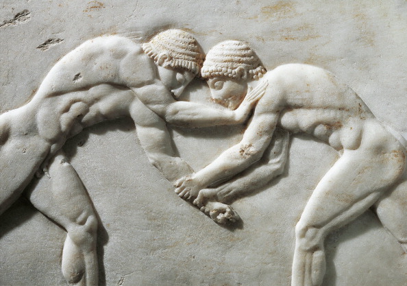 Greek civilization, Plinth of kouros statue, bas-relief depicting wrestlers, circa 510 B.C., detail, from Kerameikos necropolis in Athens, Greece